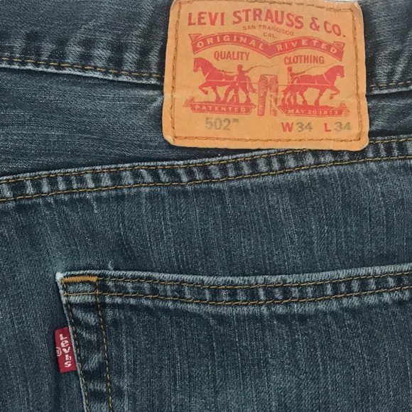 Levi’s  502 distressed edge cutoffs Size 34 - Picture 2 of 7